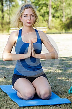 Young woman in yoga position