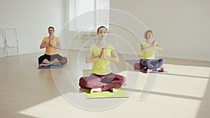 Young woman during the yoga traning relaxing