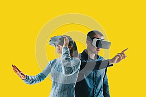A young woman and a young man in virtual reality glasses.The concept of modern technologies and technologies of the
