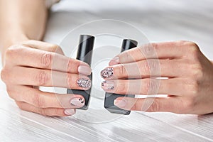 Young womans hands with beautiful manicure.