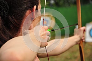 Young women with the bow photo