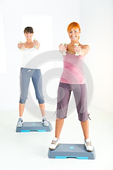 Young women doing fitness exercise