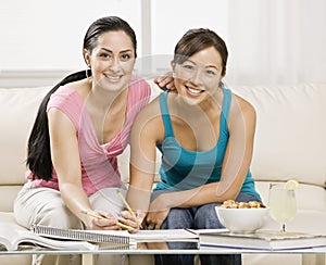 Young women doing homework