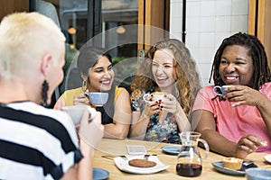 Young Women Drinking Coffee Concept