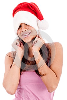 Young women embrassing wearing santa's hat photo