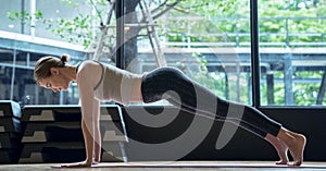 Young women exercising with yoga at the gym