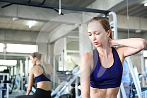 Young women are experiencing muscle aches from excessive exercise