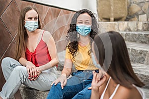 Young women with face mask during summer vacation during covid-19. focus selectivo photo