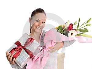 Young women with gift and flowers