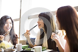 young Women group Eating hot pot