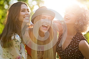 Young women hanging out at sunset