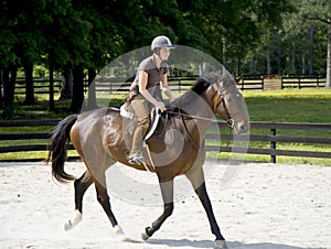 Young women horseback riding