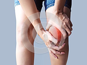 Young women with knee pain, Leg ache, suffering joint pain and muscle injury