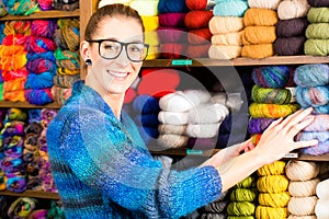 Young women in knitting shop