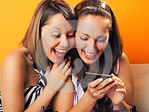 Young women looking at a cellphone