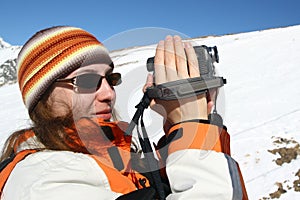 Young women making a film about mountain trip