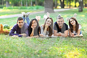 Young women and men of different ethnicity having fun together