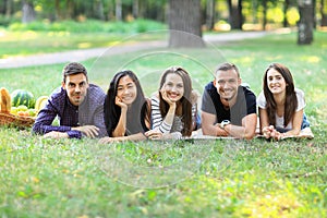 Young women and men of different ethnicity having fun together