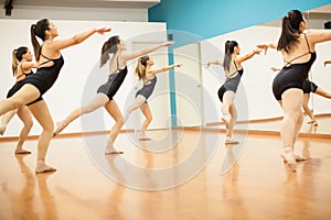 Young women rehearsing a dance routine