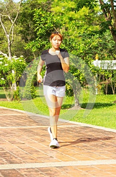 Young women with step exercise by jogging