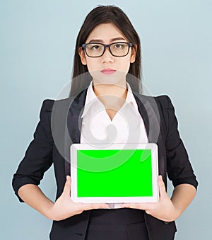 Young women in suit holding her digital tablet mock up