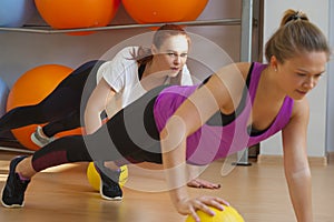 Young women training in fitness class