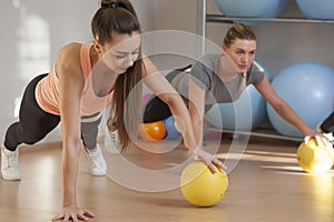 Young women training in fitness class