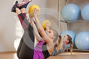 Young women training in fitness class