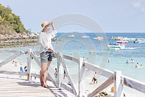 Young women traveling relax on the beach on summer, Concept beach on summer