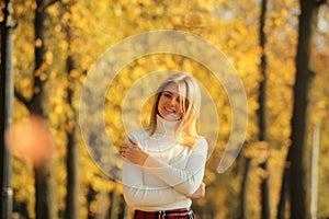 Young women walking autumn park fanny sunny day