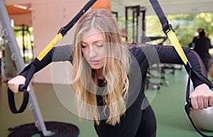 Young women wroking out in a Gym