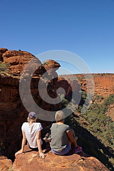 young womens enyoing view of the Kings Canyon, Watarrka National Park, Northern Territory, Australia