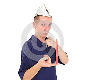 Young worker balancing pencil on his finger