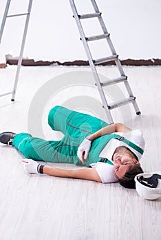 The young worker falling from the ladder