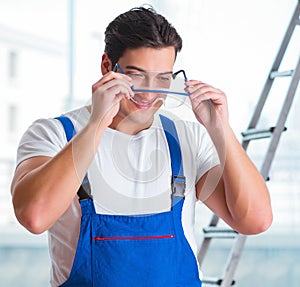 Young worker with safety goggles