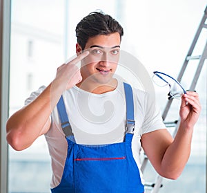 Young worker with safety goggles