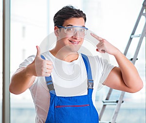 Young worker with safety goggles