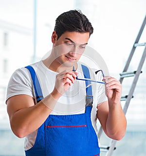 Young worker with safety goggles