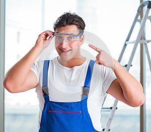 Young worker with safety goggles