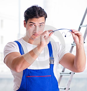 Young worker with safety goggles