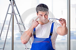 The young worker with safety goggles