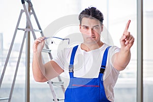 The young worker with safety goggles