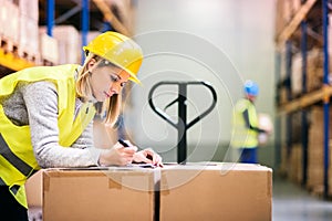 Young workers working in a warehouse.