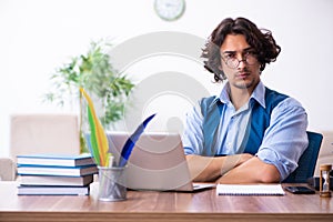 Young writer working on his new work