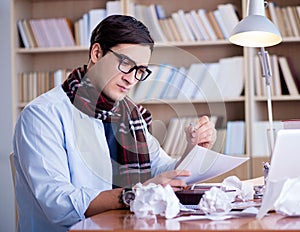 Young writer working in the library