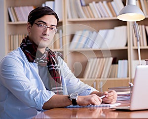 Young writer working in the library