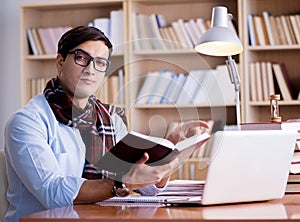 Young writer working in the library