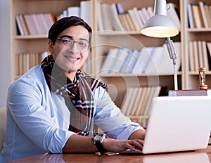 Young writer working in the library