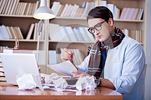 The young writer working in the library