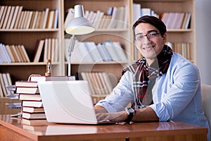 The young writer working in the library